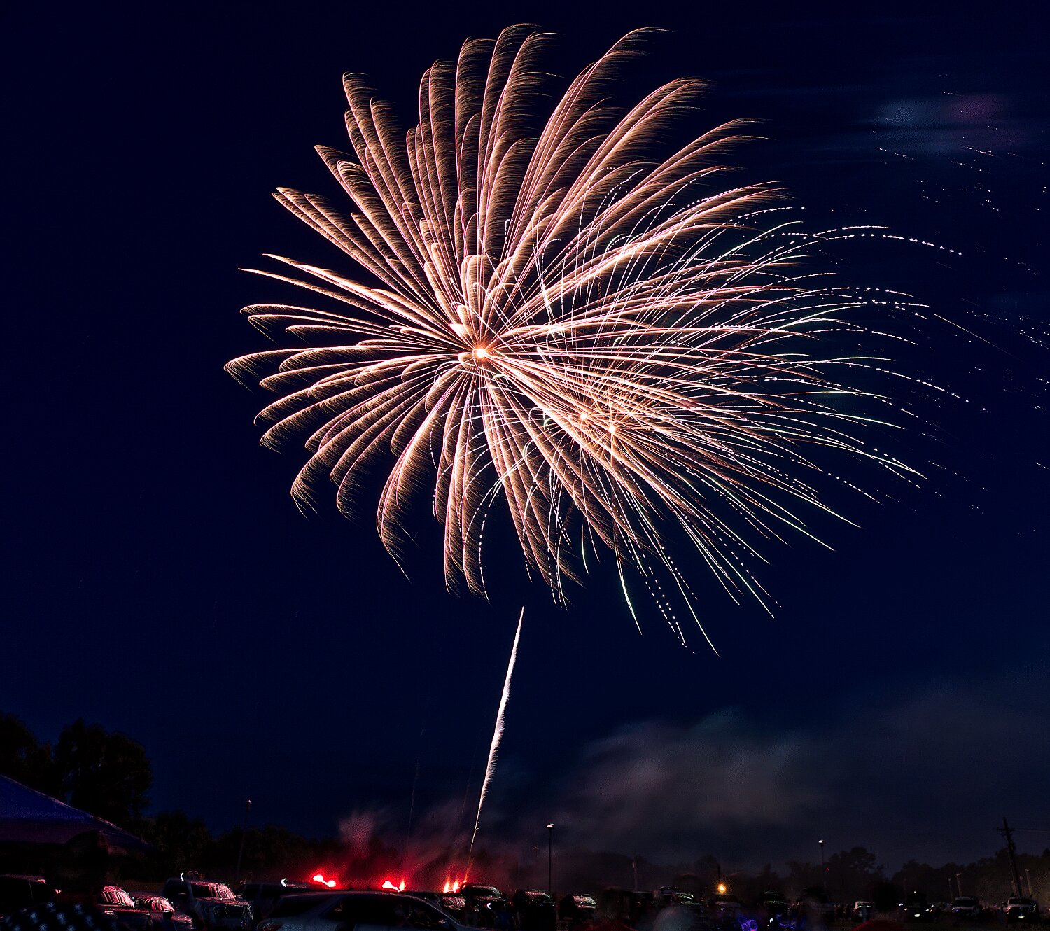 The annual fireworks show put on by the Mineola Fire Dept. began as the Lake Country Symphonic band played the last strain of "The Stars and Stripes Forever" by John Philip Sousa. [peep plenty more patriotic photos]